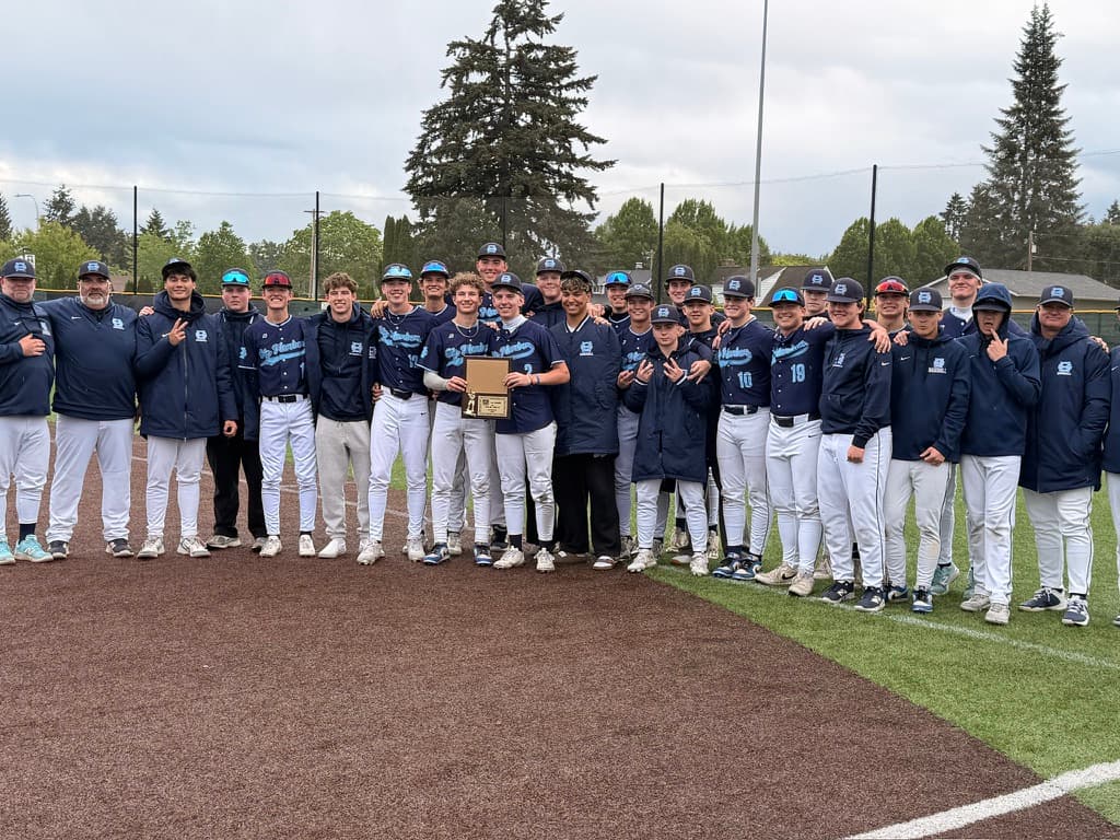 Gig Harbor Tides celebrating the 2026 District 3 Championship